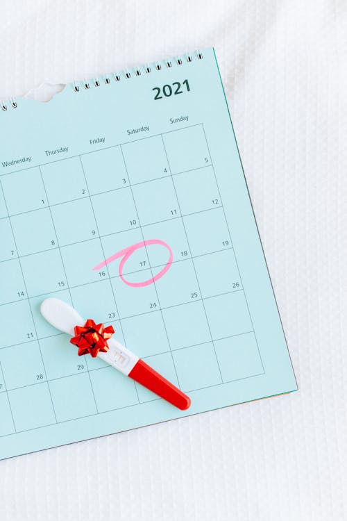 Free Pregnancy Test on a Calendar  Stock Photo