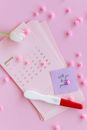 Happy Birthday Greeting Card Beside White and Red Toothbrush
