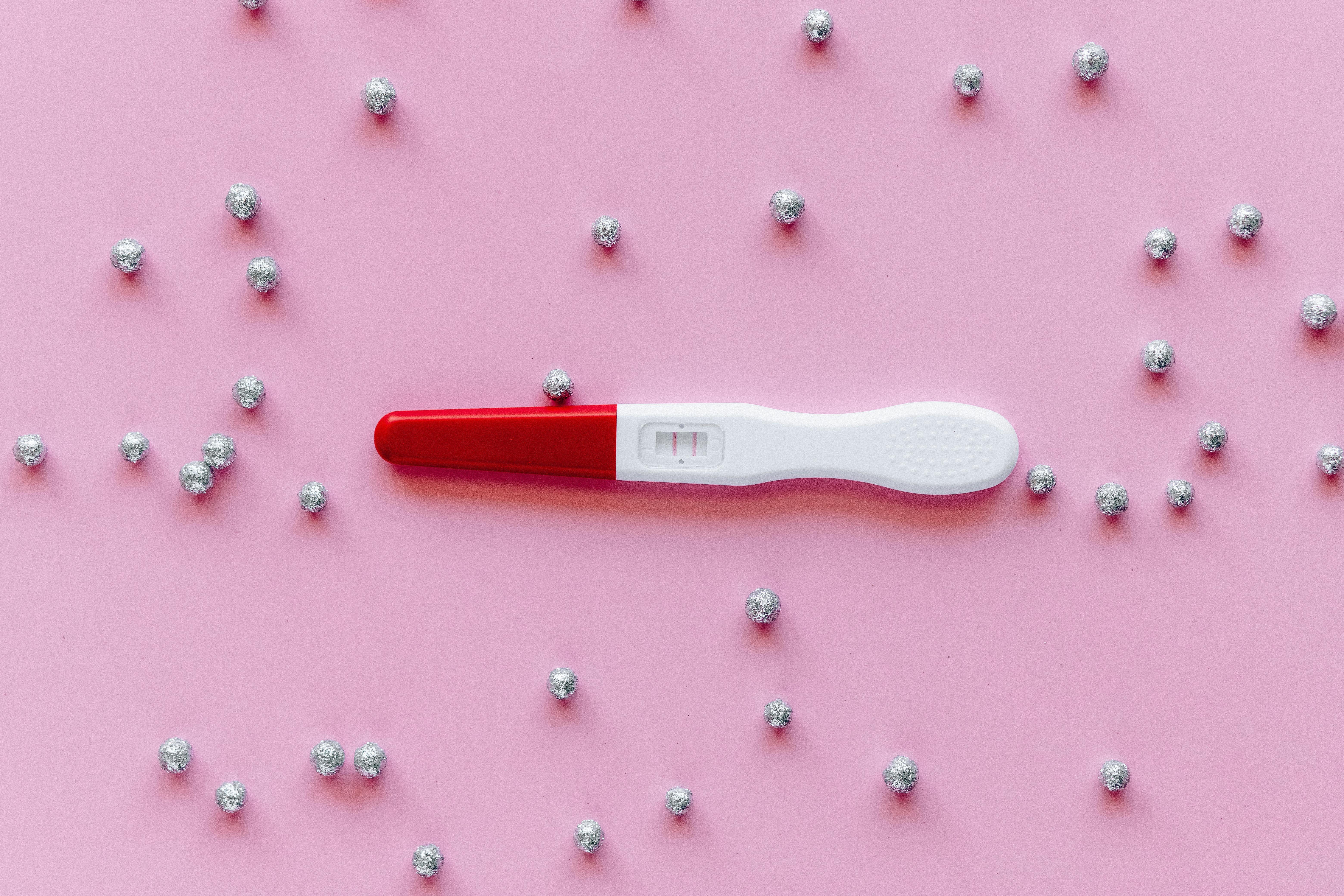 red and white digital thermometer