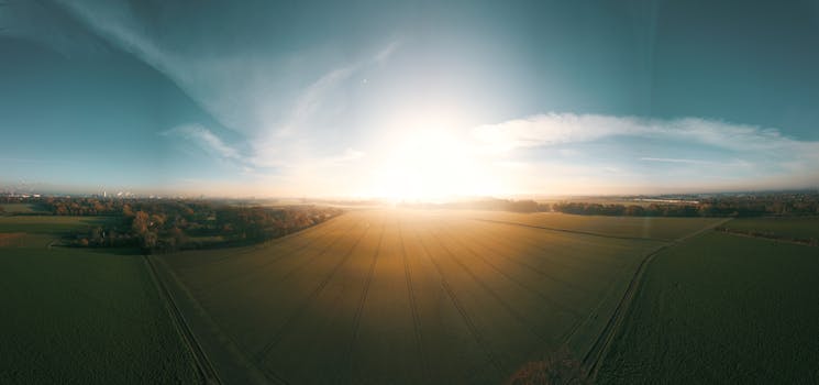 Stunning aerial view of sunny fields near Krefeld, Germany, captured at sunrise.