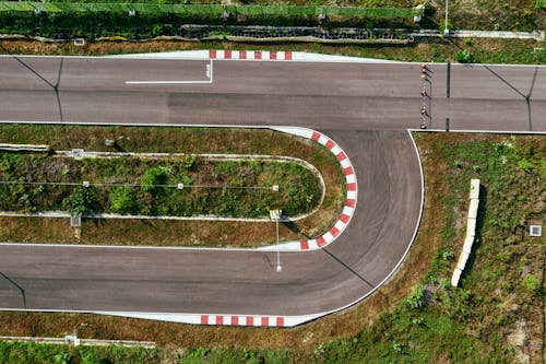 Contemporary asphalt curvy road with marking lines