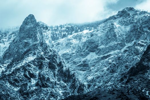 Stunning snow-covered mountains showcasing a serene winter landscape.