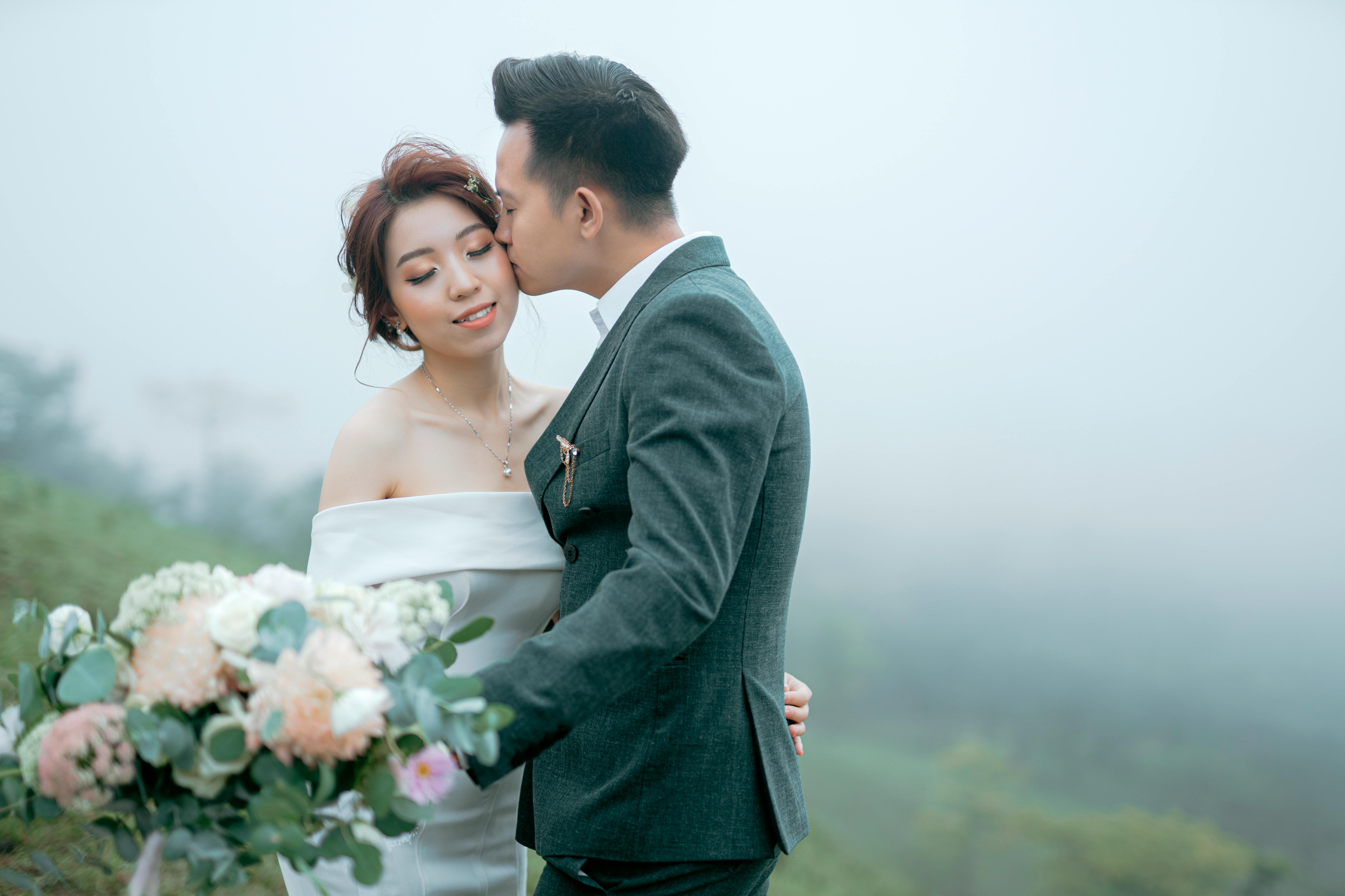 Wedding black couple kissing and showing ring on ring finger · Free ...