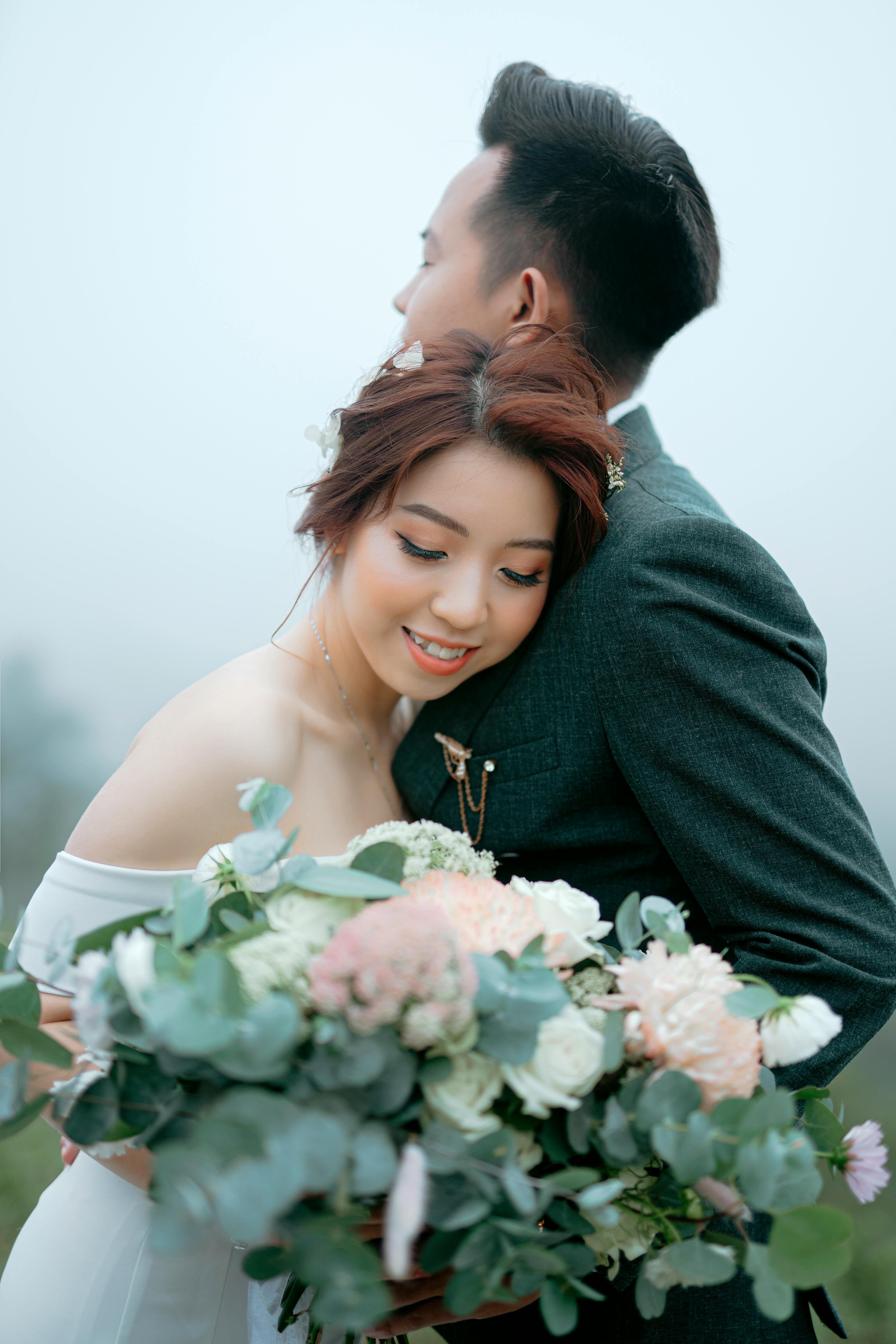 Sensual ethnic newlyweds in sunny evening · Free Stock Photo