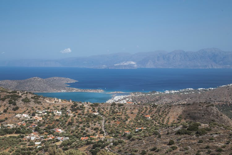 Breathtaking Scenery Of Coastal Town Near Blue Sea