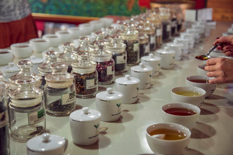 Crop Faceless Woman Taking Tea During Tea Tasting