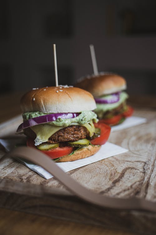 Delicious burgers with beef cutlet and red onions