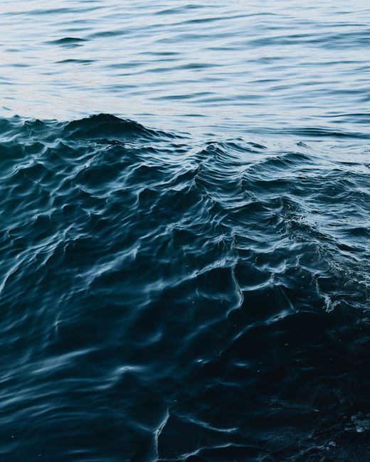 Serene ocean waves captured at Newport Beach, California, showcasing the natural beauty of the sea.