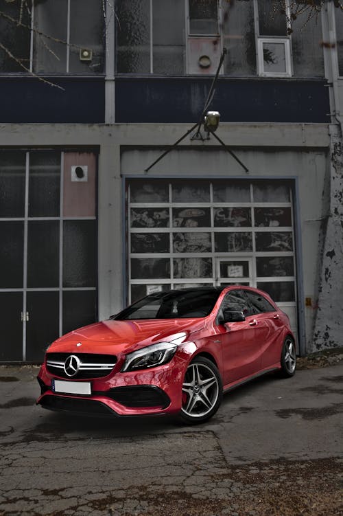 Red car parked near building