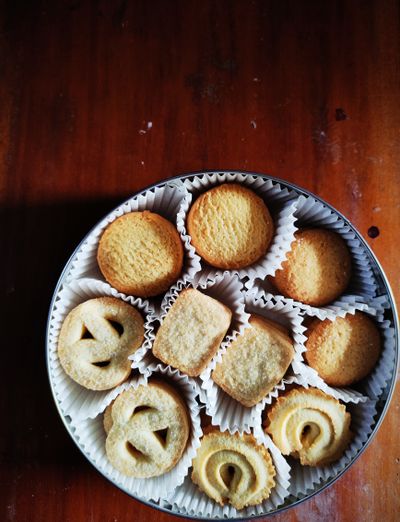 Assorted Danish butter cookies arranged in a round tin — photo by Soumith Soman on Pexels
