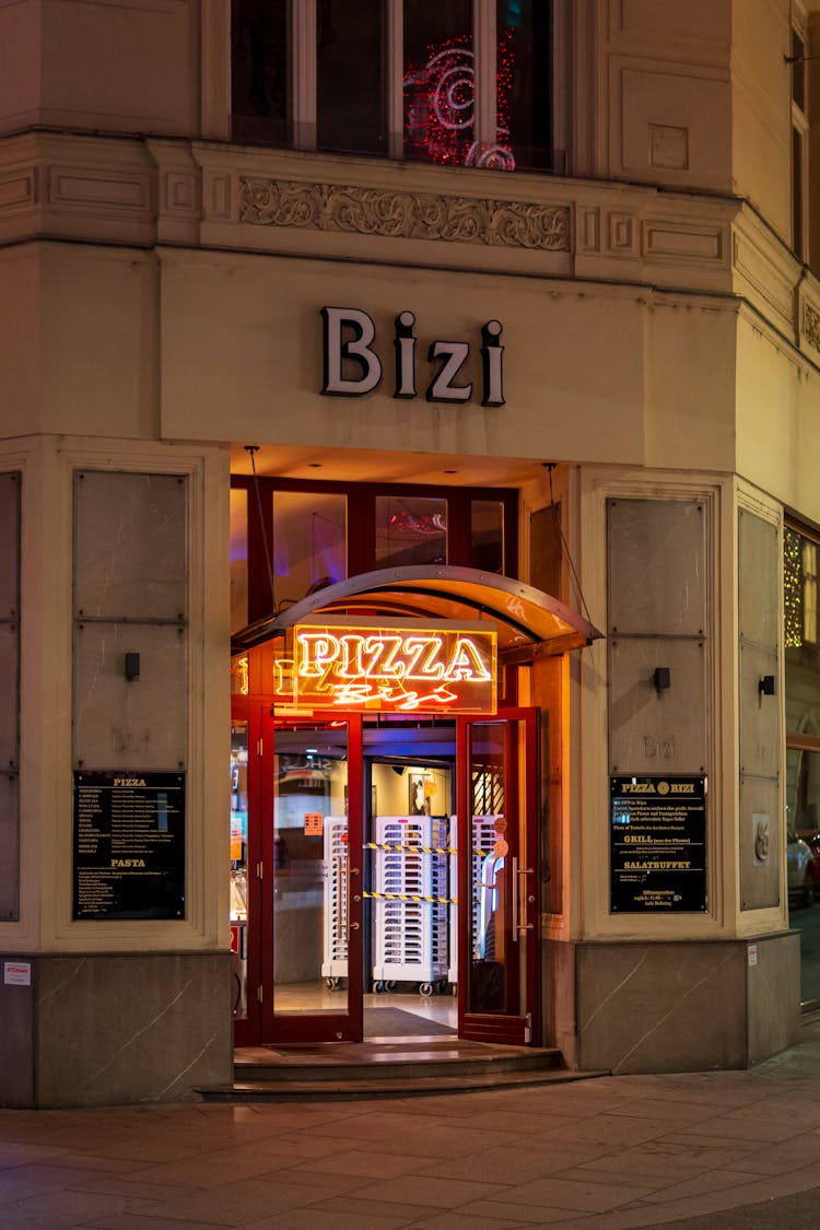 Pizza Parlor With Neon Signages