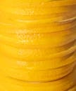 Full frame background of pile of sliced pieces of fresh juicy orange in closeup