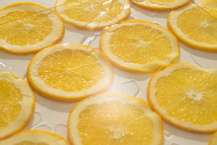 Citrus Fruit Slices On White Background