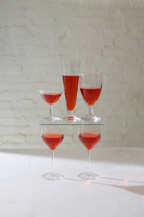 Composition of glasses with red drink