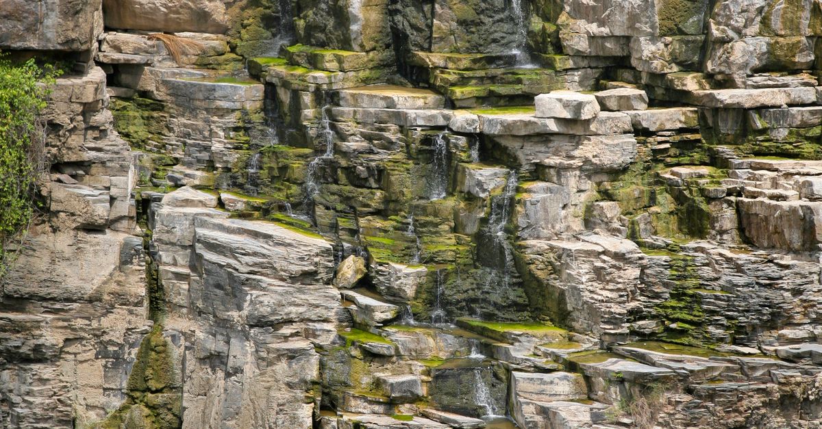 Cascaded Rocks Cascade on the Rocks · Free Stock Photo
