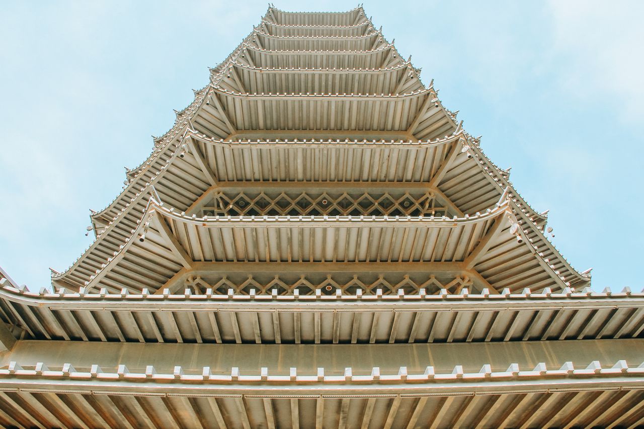low angle view of a multi storey pagoda showcasing intricate architect
