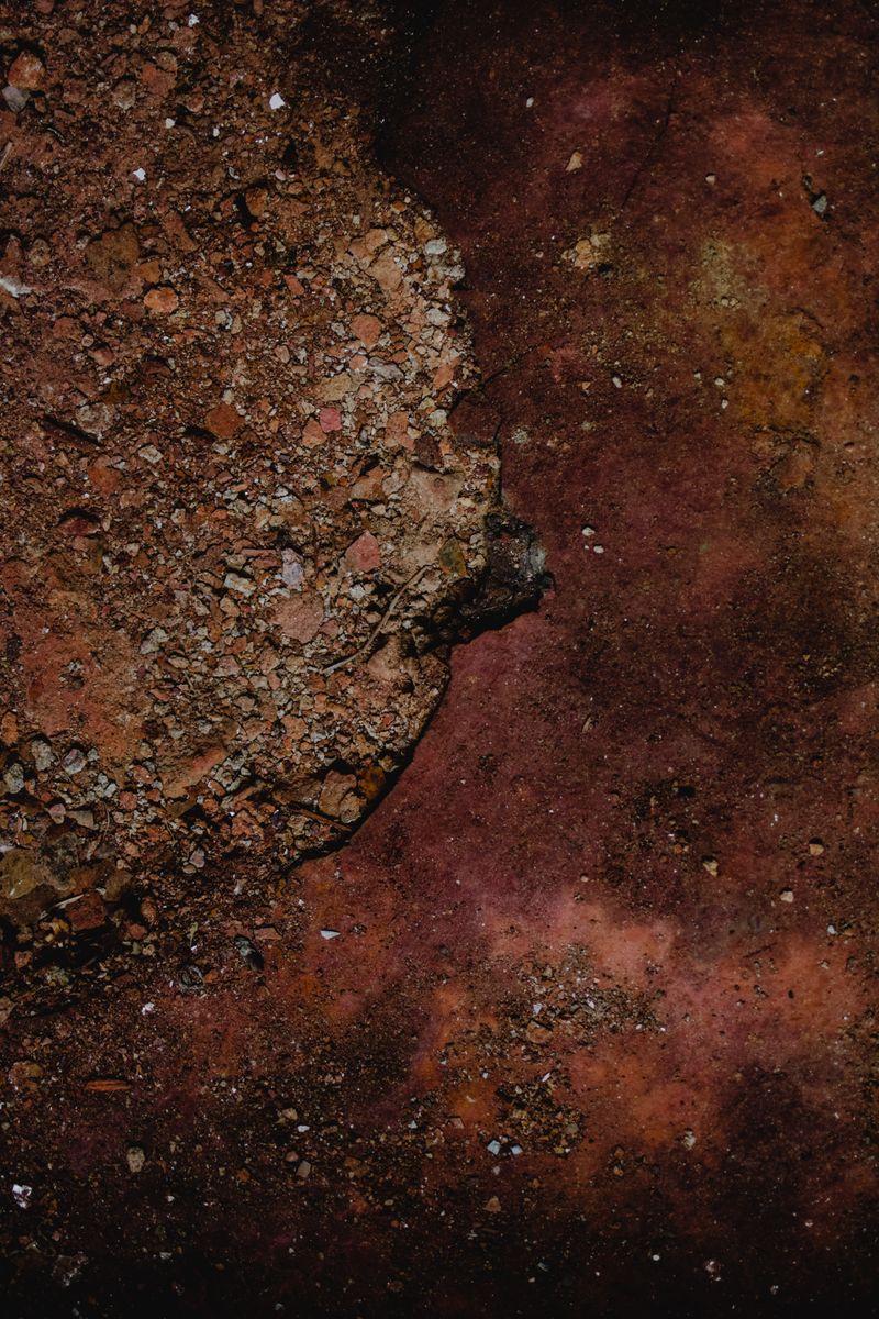 Reddish-brown crushed fragments