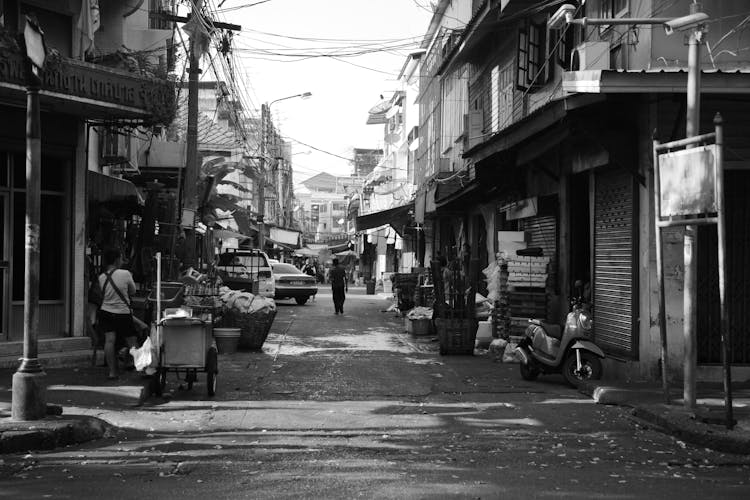 Narrow Dirty Street In Asian City