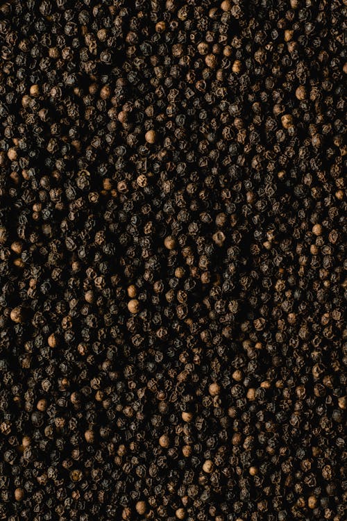 Close Up Photo of Whole Peppercorns