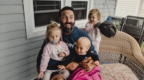 Free Happy man with children on terrace Stock Photo