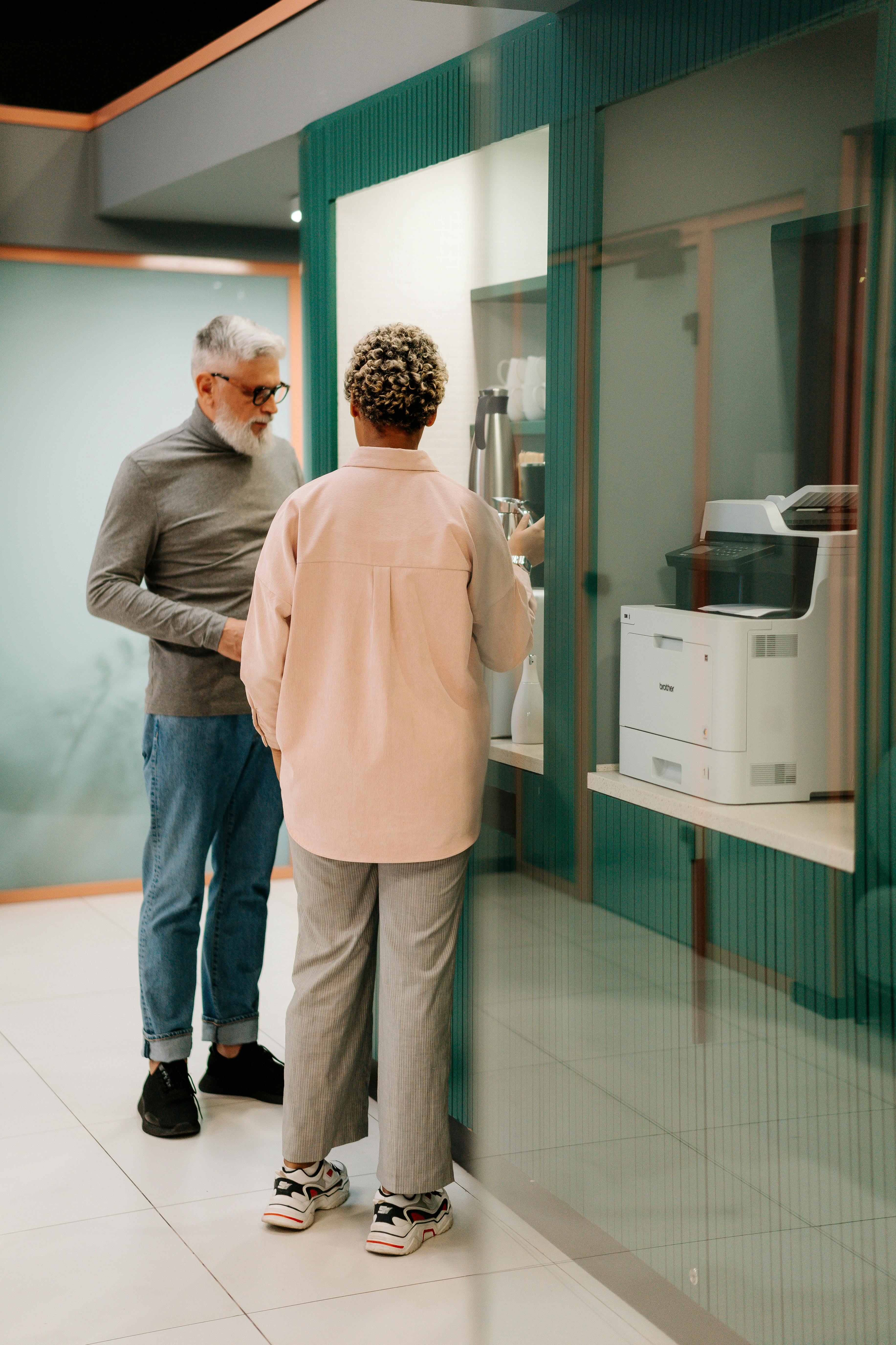Professional locksmith helping a customer with a lockout emergency