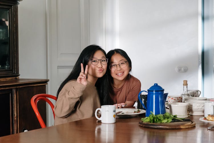 Two Cute Girls Smiling At The Camera