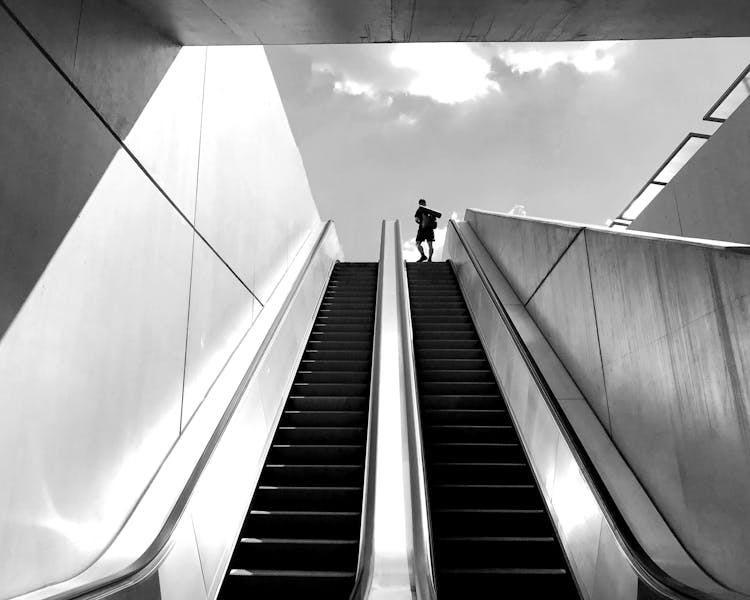 Man On Escalator