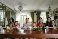 Family Dinner in a Large Dining Room