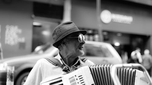 Free Man Wearing Hat Playing Accordion Stock Photo