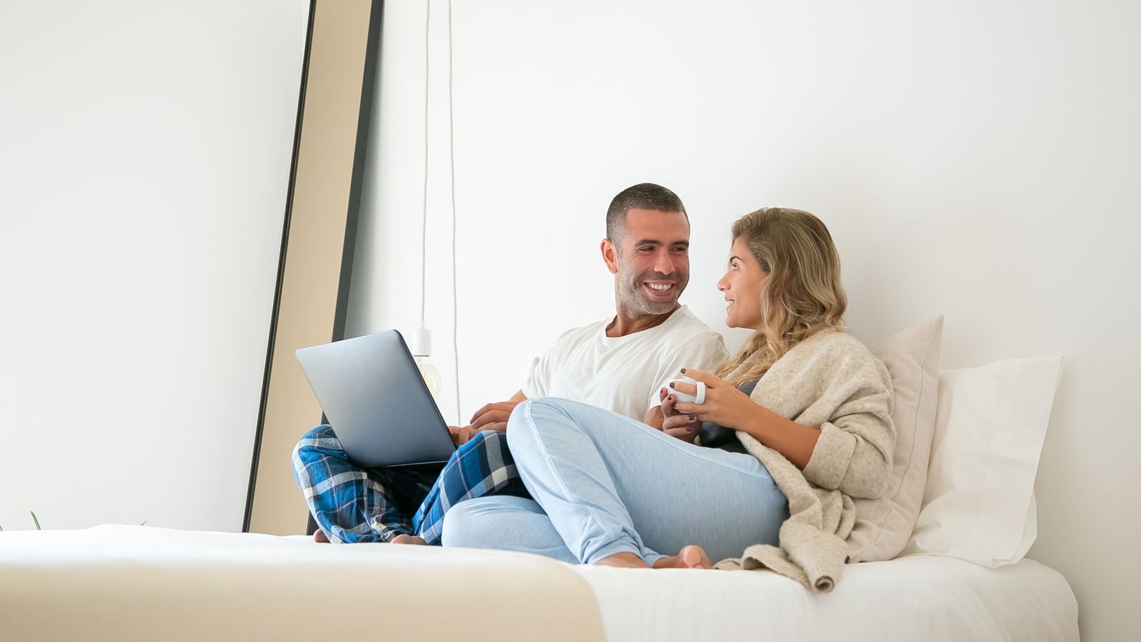 A relaxed, happy married couple at home