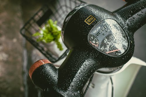 Close-up of a Speedometer on a Scooter Wet from Rain 