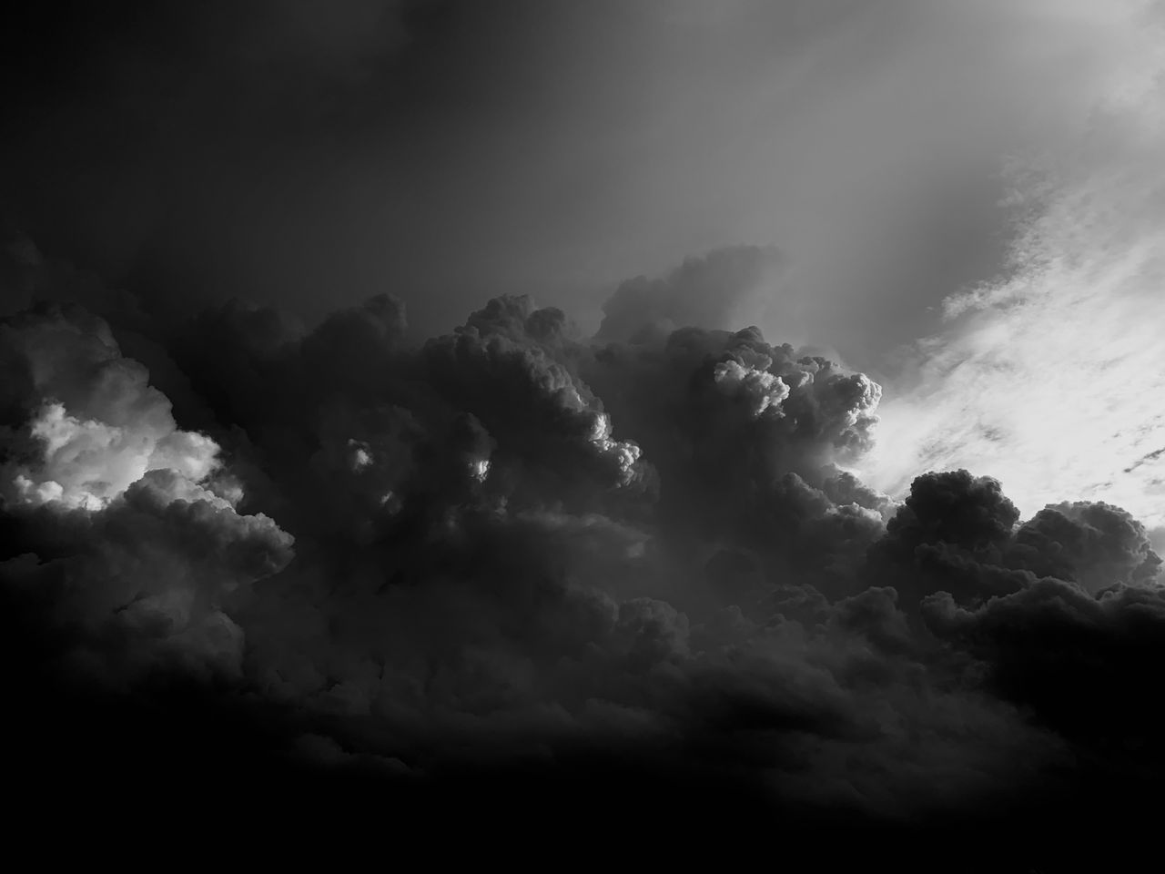 moody monochrome clouds depicting a dramatic sky above chennai india