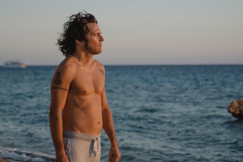 Topless Man at the Beach