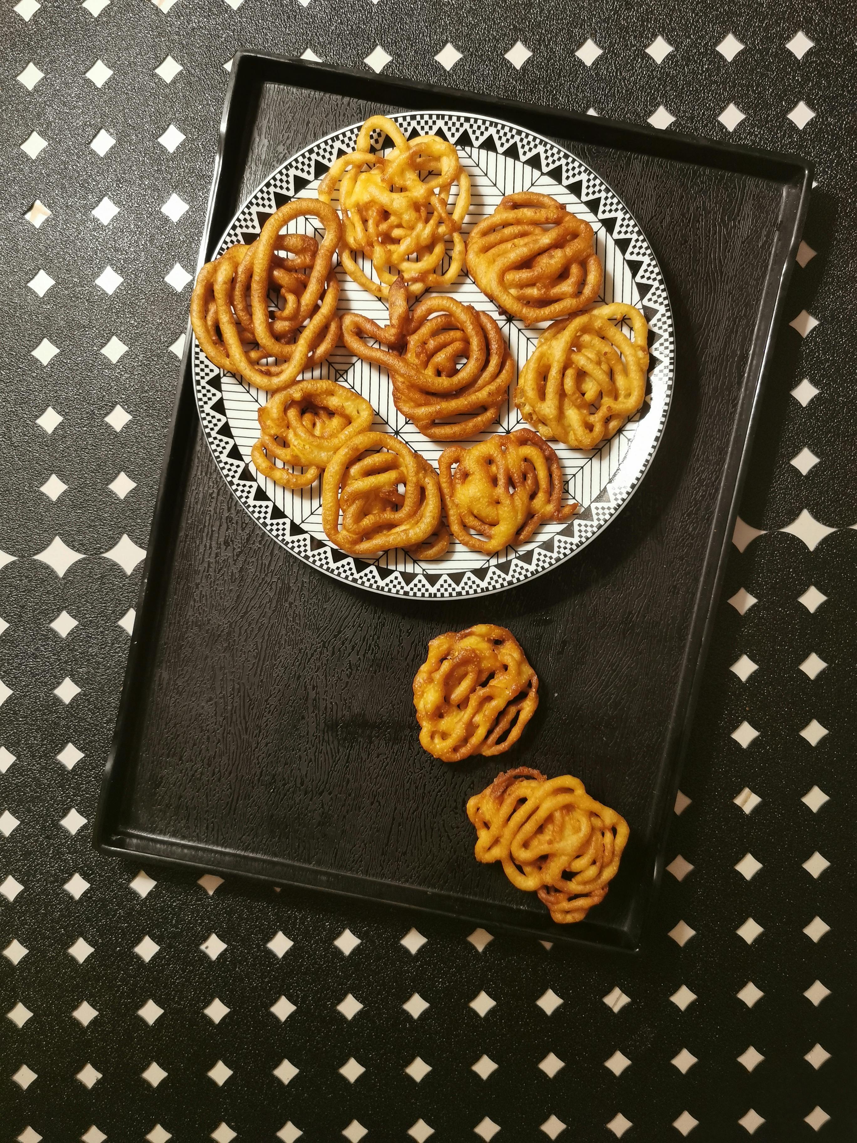 Culinary tradition Jalebi, a crispy and timeless Indian sweet treat  Vertical Mobile Wallpaper AI Generated 30464689 Stock Photo at Vecteezy