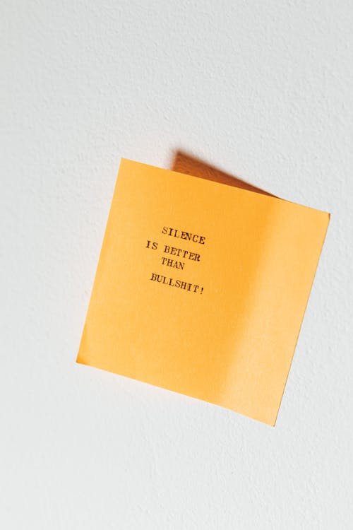 Yellow Sticky Note with a Text Written on a Typewriter
