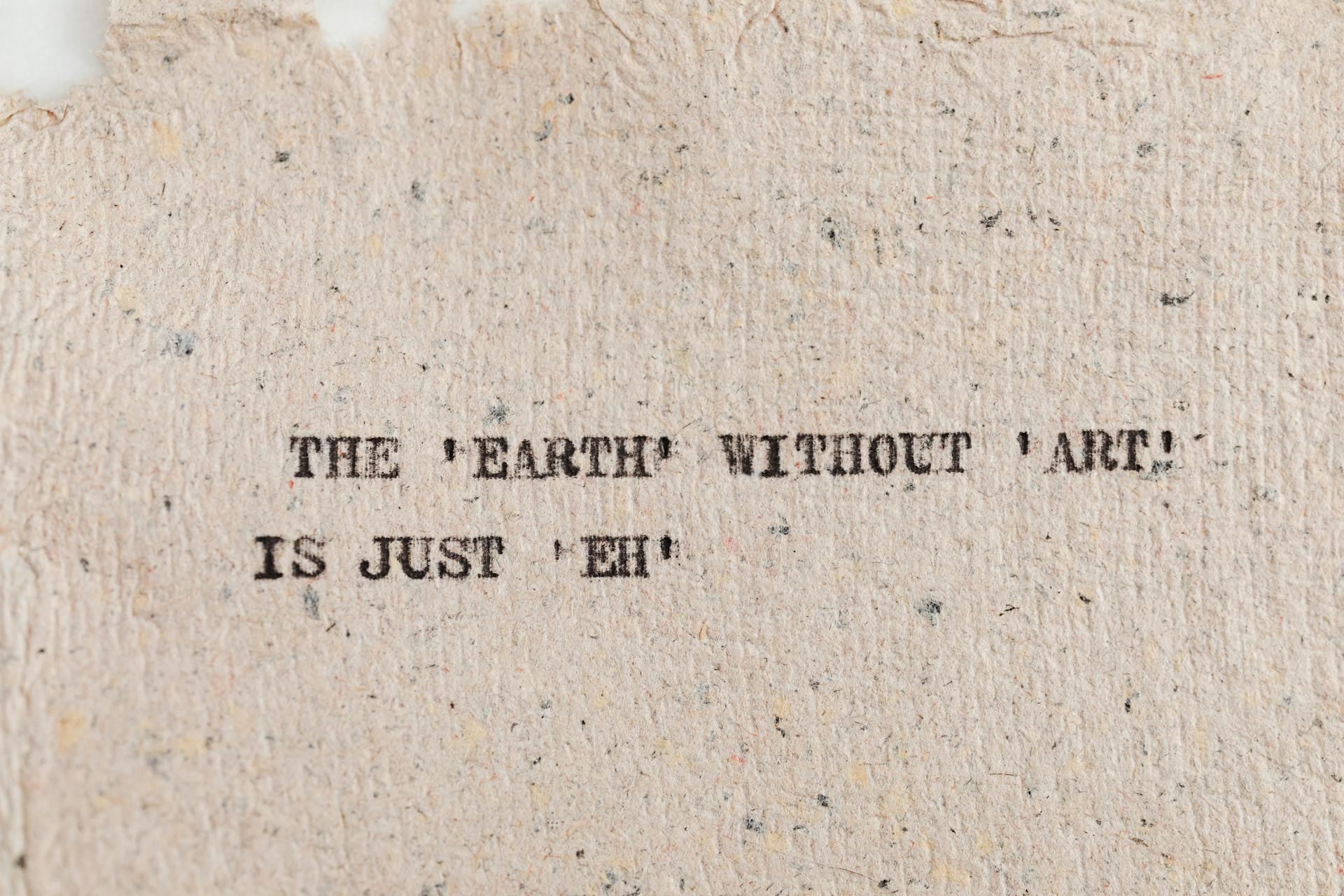 Textured paper with motivational quote highlighting art's importance.