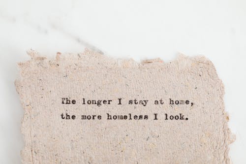 Quote Written with a Typewriter on a Recycled Paper Sheet 