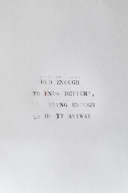 Minimalist paper with an inspiring typewriter quote creating a motivational message.