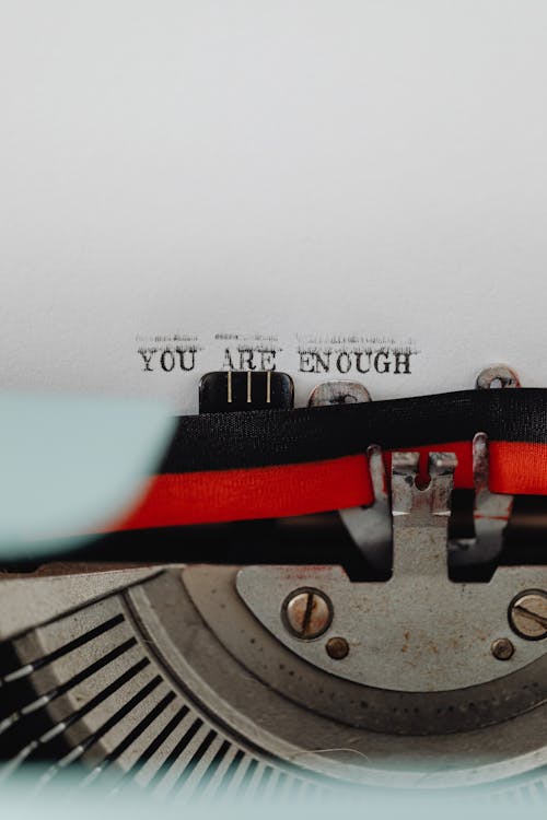 Free Inspirational Phrase Coming out of a Typewriter Stock Photo
