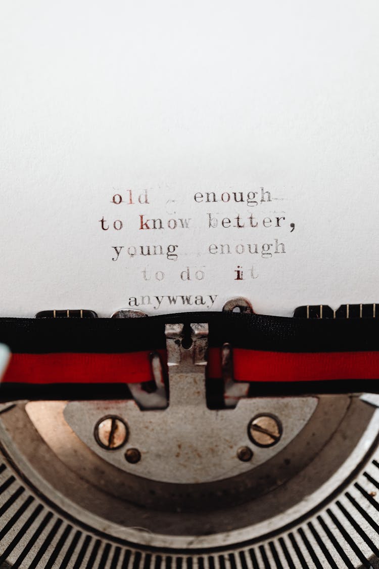 Inspirational Phrase Coming Out Of A Typewriter