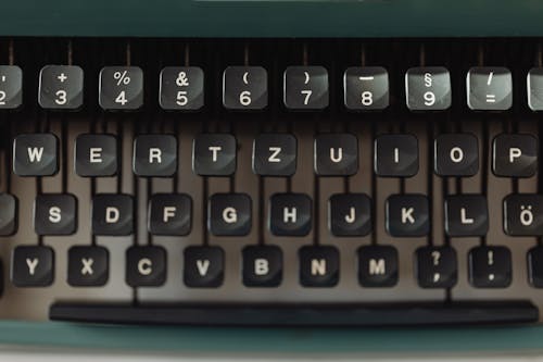 Free Close Up Photo of Black Typewriter Keys Stock Photo