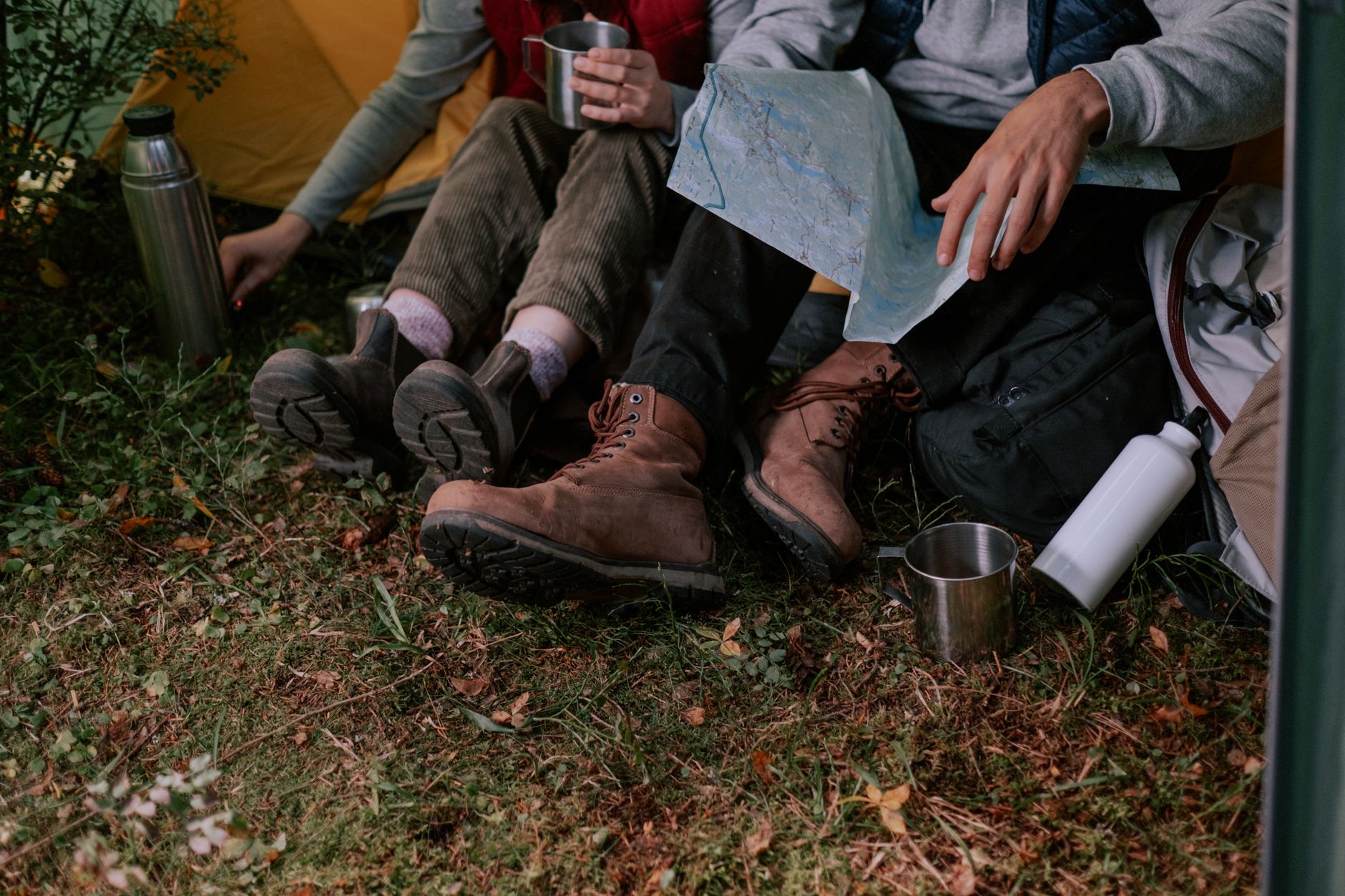 https://www.pexels.com/photo/persons-wearing-boots-sitting-5994392/
