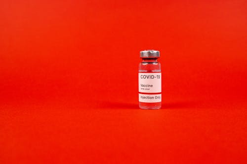 Covid Vaccine in Small Glass Bottle