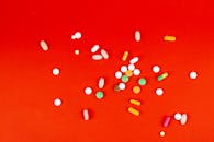 Medications on Red Surface