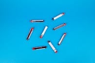 A Close-Up Shot of Blood Samples on a Blue Surface