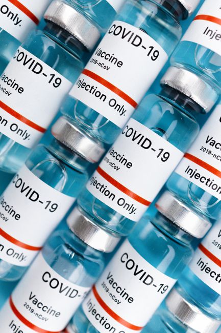 Detailed shot of COVID-19 vaccine vials labeled for injection only.