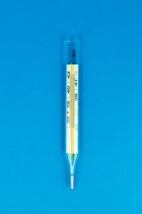 
A Thermometer on a Blue Surface
