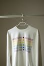 White Long Sleeve Hanging on the Rack