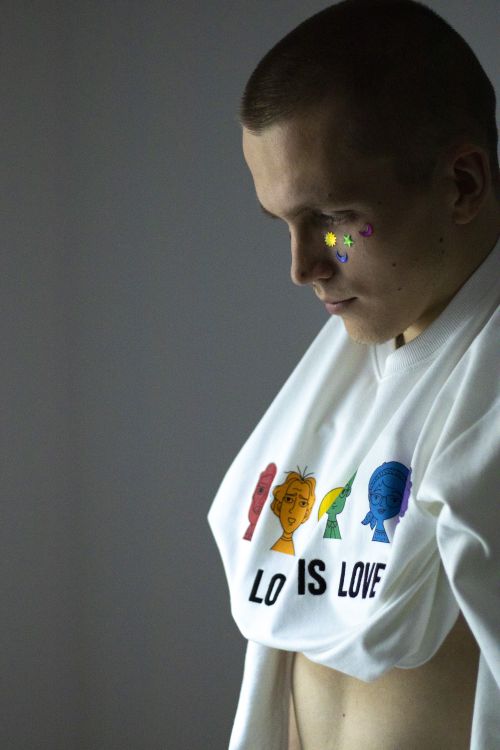 Free Portrait of a person in a studio, showcasing LGBTQ pride with creative expression. Stock Photo