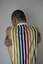 Man in Rainbow Stripe Tank Top